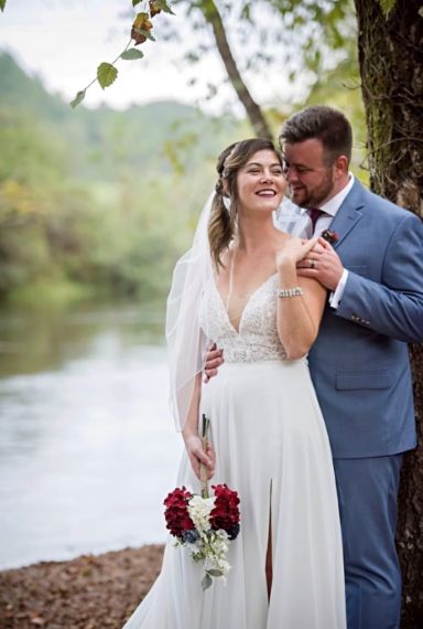 Couple by the river